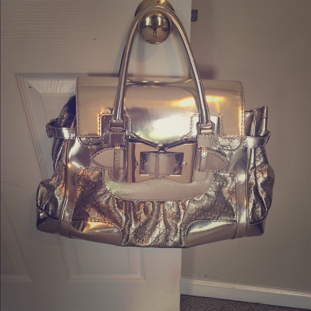 Authentic Gucci gold Queen tote.